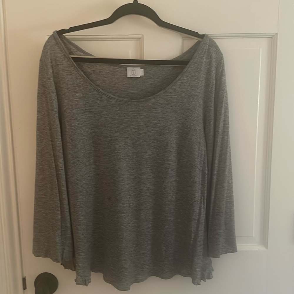 Blouse. Ruffled back bottom